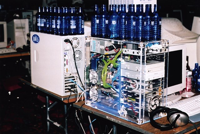 Clear acrylic case with lots of Bawls . . . (qcon2003_12.jpg, 640w x 430h )