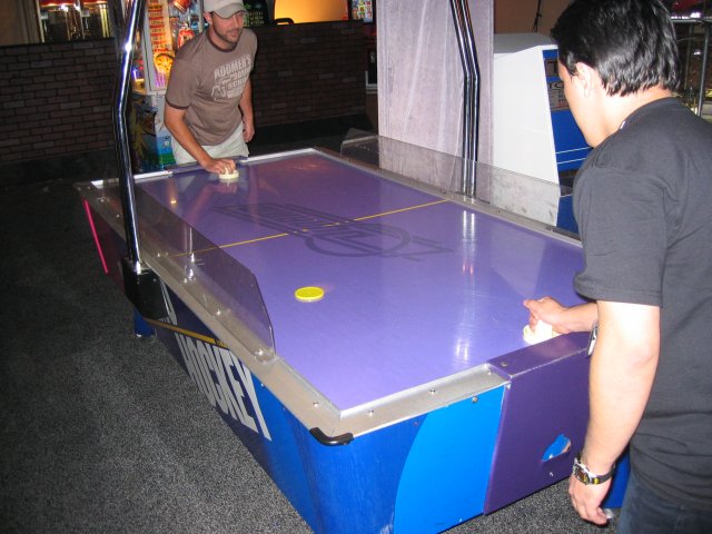 Alien and Bloodwolf face off in Air Hockey. (qc052043.jpg, 640w x 480h )