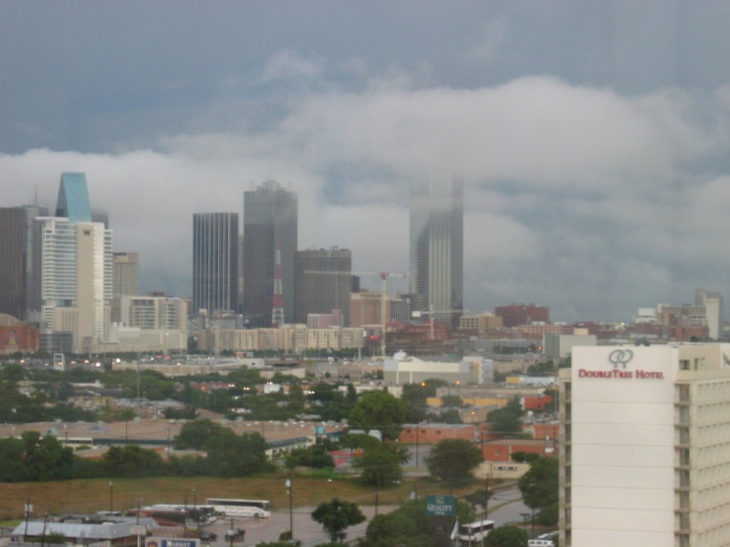A huge storm came though Dallas at about 6:00 PM.  Afterwards, these low clouds moved through downtown. (qc070024.jpg, 800w x 600h )